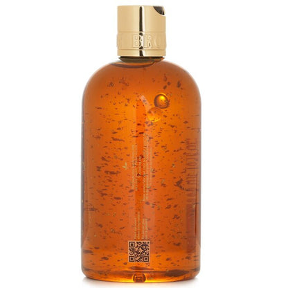 Gel de baño y ducha Mesmerising Oudh Accord &amp; Gold de Molton Brown, 300 ml/10 oz